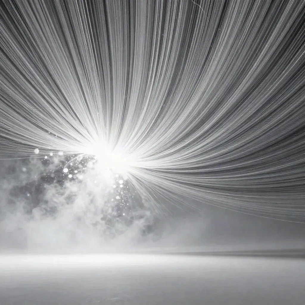 Abstract silver light filaments converge into a soft white bloom on graphite space.